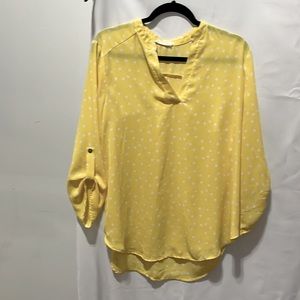 White, yellow polkadot shirt